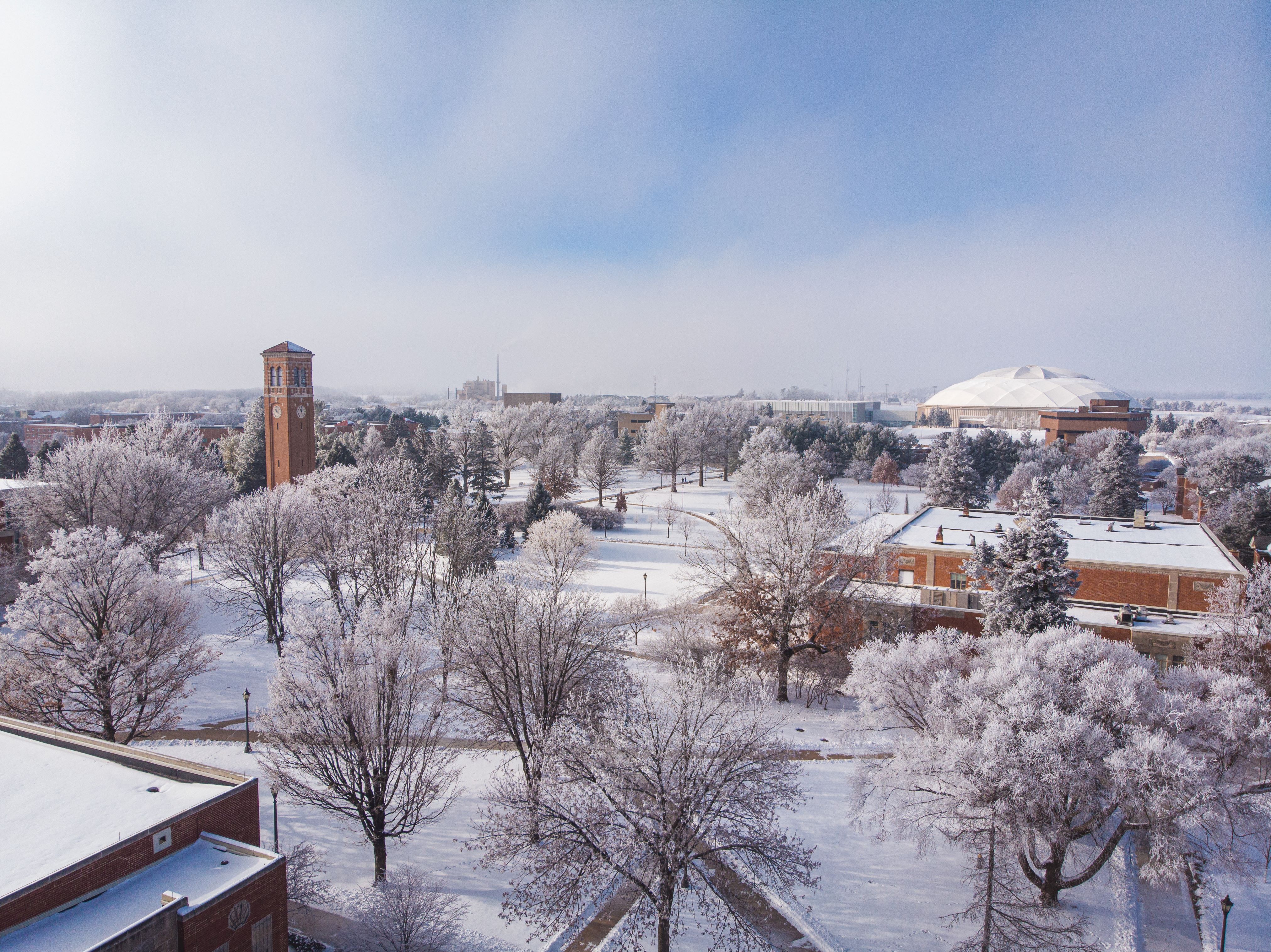 Aerial image of University of Northern Iowa campus during winter with snow